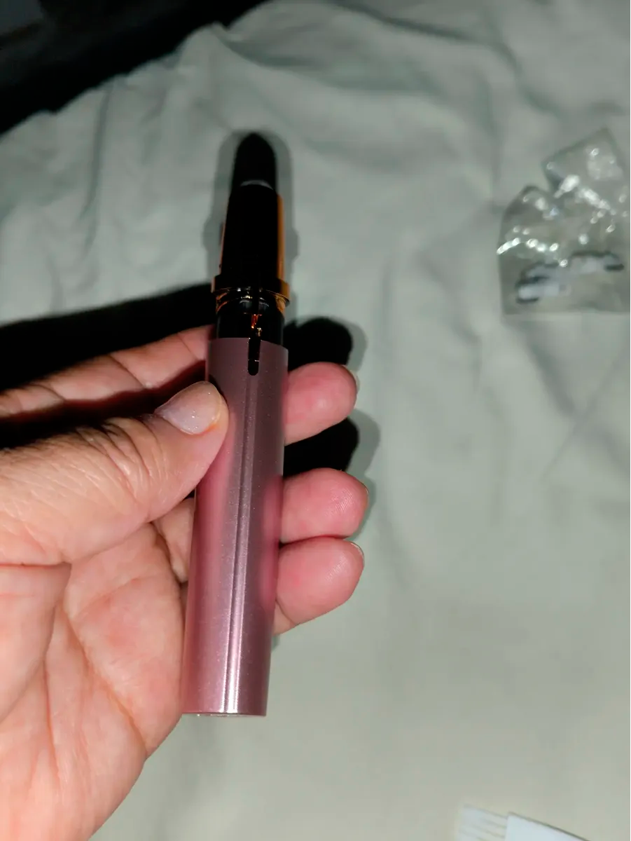 Depiladora de cejas oro rosa
