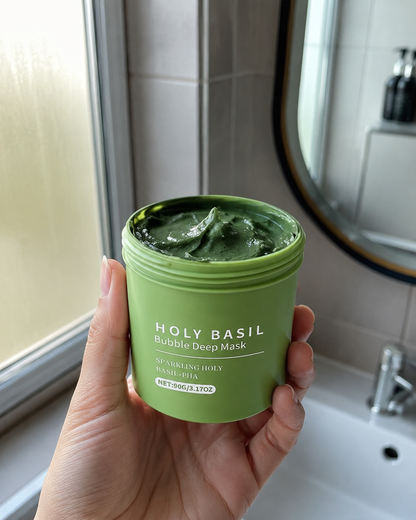 HOLY BASIL sostenida con una mano